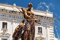 Fontana di Diana [it] (1907), by Giulio [it] and Mario Moschetti [it] In reinforced concrete at Piazza Archimede in Syracuse, Sicily
