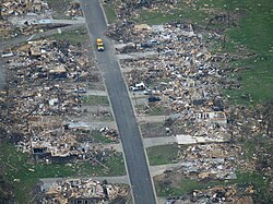 Debris still present 10 days after the Joplin tornado struck the city of Joplin, Missouri.