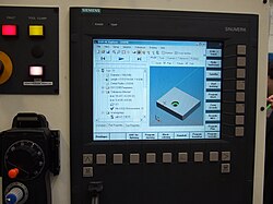 STEP-NC interface on a CNC, showing product shape and color-coded tolerance state