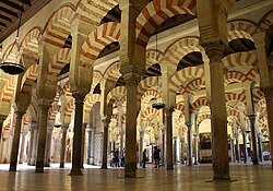 Interior of the Mosque–Cathedral of Córdoba, the former Great Mosque built by Abd ar-Rahman I in 785, later expanded by his successors[33]