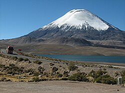 The lava domes are visible as grey hills