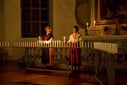 Candles, representing the light of Christ, are lit at Hedemora Evangelical-Lutheran Church in Sweden in honour of the saints