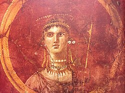 A medallion painting from the House of Marcus Fabius Rufus in Pompeii, Italy, executed in the Second Style and depicting the Greco-Roman goddess Venus-Aphrodite in regalia, with diadem and scepter; it is dated to the 1st century BC.