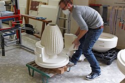 De-moulding a large vase after it has been slip cast