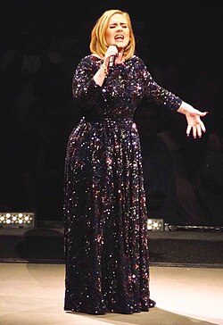 Adele singing in St. Paul, Minnesota during her first North American tour in five years in July 2016. Ten million people attempted to purchase tickets for the North American leg of Adele's world tour. Only 750,000 tickets were available.[115][116]