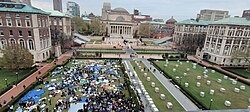 The sit-in on the West Lawn, occupied autonomously by the crowd that gathered at the time of the arrests, the following day after having held the lawn through the night. The East Lawn has obstacles placed to prevent a reestablishment of the original encampment, April 19.