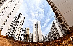 Rows of empty high-rise residential towers in Chenggong District