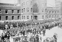 Members of the 48th Regiment "Highlanders" depart for camp from a Toronto armoury, 1914.