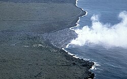 Aerial view of Kamoamoa lava delta forming, Kilauea