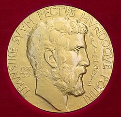 The front side of the Fields Medal with an illustration of the Greek polymath Archimedes