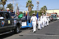 Sailors take part in the annual St. Patrick's Day parade.