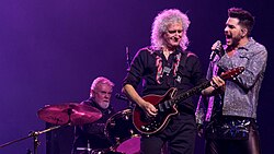 Queen performing with Lambert during their 2017 tour