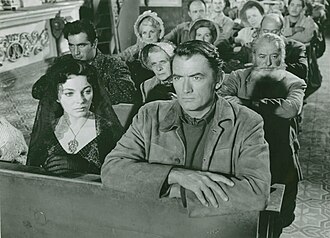 Collins and Gregory Peck in a scene from The Bravados (1958).