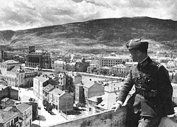 A Bulgarian officer looking at Skopje's centre, April 1941