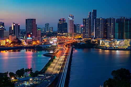 Johor–Singapore Causeway & Johor Bahru skyline. This causeway across the Strait of Johor is among the world's busiest border crossings.