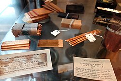 Matches from 1828. The sulfur-tipped match is dipped into liquid containing white phosphorus, and ignites as it is pulled out of the bottle.