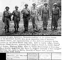 General Douglas MacArthur meeting Navajo, Pima, Pawnee and other Native American troops