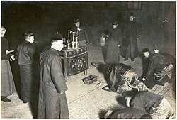 Men gathering to receive the Gods in the Chinese New Year, 1900s