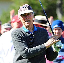 Playing golf at a charity fundraising event in 2015