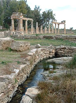 Temple of Artemis at Brauron. The stoa and the sacred spring from the SW.