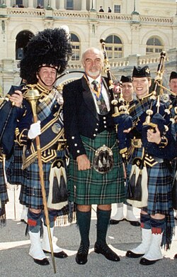Connery at a Tartan Day celebration in Washington, D.C. When knighted by Queen Elizabeth II in 2000, he wore a green-and-black hunting tartan kilt of his mother's Clan Maclean.[132]