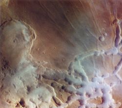 Morning water ice fog spills out of Noctis Labyrinthus (Viking 1 orbiter image)