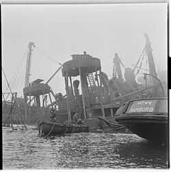 1952 close-up of Donau being salvaged. It shows two of her anti-aircraft guns on their raised platforms.