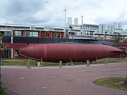 One of the first submarines with diesel–electric transmission, HMS Hajen, on display outside Marinmuseum in Karlskrona