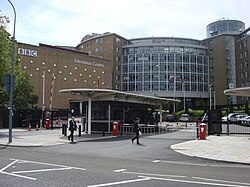 Queen performed "Killer Queen" at BBC Television Centre (pictured) on the music chart show Top of the Pops in December 1974. This was their second appearance on the show; their previous (performing "Seven Seas of Rhye") brought them overnight fame.[55]
