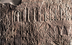 Photo of the Assyrian wall relief showing a garden in the ancient city of Nineveh (Mosul, Iraq)