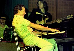 Lewis performing in 1977