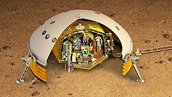 Cutaway illustration showing InSight's seismometer underneath the white windshield