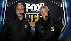 Spielman (left) with play-by-play announcer Thom Brennaman during the 2018 NFL season.