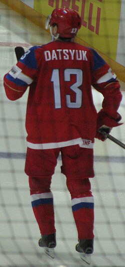 Pavel Datsyuk (Cyrillic: Павел Дацюк), a former NHL and international ice hockey player, wearing a sweater with Latin characters