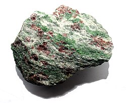 Eclogite from Almenning, Norway. The red-brown mineral is garnet, green omphacite and white quartz.