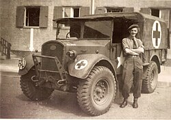 Friends' Ambulance Unit (FAU), a volunteer service founded by British Quakers, with a FAU ambulance and driver pictured in Germany in 1945