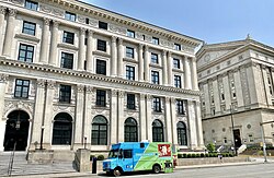 The Pittsburgh Athletic Association building, one of several Pitt buildings listed on the National Register of Historic Places, is pictured to the left of Alumni Hall, both Benno Janssen designed buildings that are examples of Renaissance Revival and Greek Revial architecture, respectively.