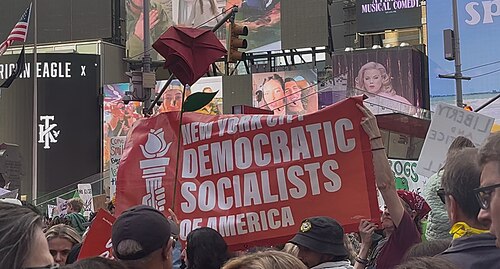 A DSA banner at October 2025 No Kings protests