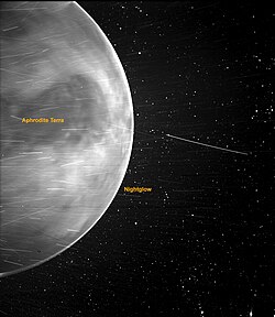 Nightglow is since 2022 considered the most likely candidate for the ashen light. In this visible light near-infrared image it is most discernable as a bright line along the limb of Venus.[192] The surface and its features, like the visible dark patch in this image, the Ovda Regio plateau of Aphrodite Terra, is much less discernable by the human eye, though reportedly seen by some people, possibly due to higher sensitivity in the spectrum that the surface glows.[193]