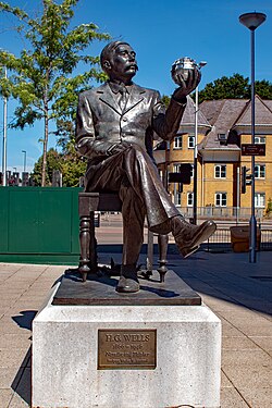 "Novelist and thinker". Statue of H. G. Wells by Wesley Harland in Woking