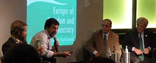 Matteo Salvini with the Eurosceptic economists Claudio Borghi Aquilini, Alberto Bagnai and Antonio Maria Rinaldi during the No Euro Day in Milan, 2013. All economists were later elected MPs in different assemblies.