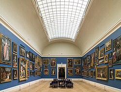 A salon-style gallery of paintings in the RISD Museum