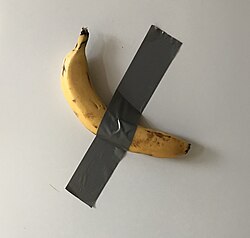 December 7 – The banana and duct tape in Comedian, an artwork created in an edition of three for the 2019 installation of Art Basel Miami Beach by Maurizio Cattelan, consisting of the aforementioned fruit held to a wall by duct tape (the initial one of which was sold to an unnamed French art collector for US$120,000) is summarily eaten by David Datuna a self-styled performance vigilante who names his piece Hungry Artist and says of the finished work "It was very delicious". Galerie Perrotin, the exhibitor of the work at the art fair, replaces the fruit and states that the work is an "idea".[30]