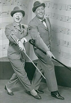 Rooney and James Dunn in the television special Mr. Broadway (1957)