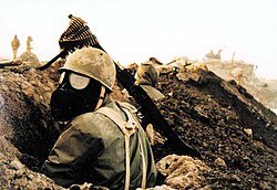 An Iranian soldier with gas mask during the Iran–Iraq War