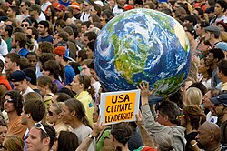 Images of Earth taken from space, which can cause a mild version of the overview effect, have become prominent symbols of environmental concern.[1] Shown: Earth Day demonstration, 2010.