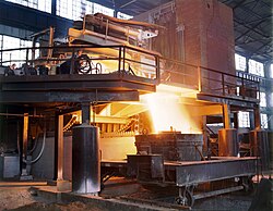 White-hot steel pours like water from a 35-ton electric furnace, at the Allegheny Ludlum Steel Corporation, in Brackenridge, Pennsylvania.