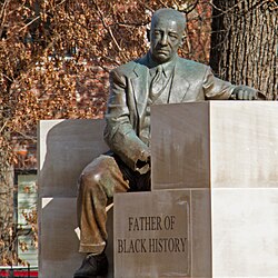 A statue of Woodson at Carter G Woodson Memorial Park in the Shaw neighborhood of Washington, D.C. sculpted by Ray Kaskey.
