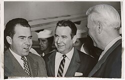 Rhodes (center), serving as state auditor, greeting Vice President Richard Nixon alongside Senator John W. Bricker in 1954 during Rhodes's first gubernatorial campaign.