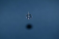 Water drop held together by surface tension